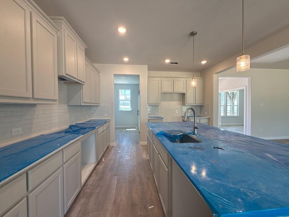 156 Oak Grv Way Springtown, TX 76082 - Photo 8 of 17 a large kitchen with granite countertop lots of counter top space