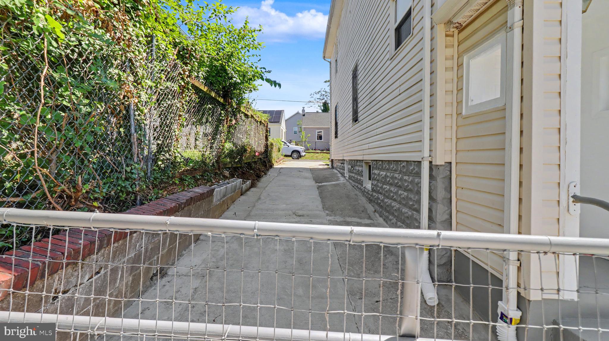 4203 Shell Street Capitol Heights, MD 20743 - Photo 5 of 47 a view of a balcony with a tree