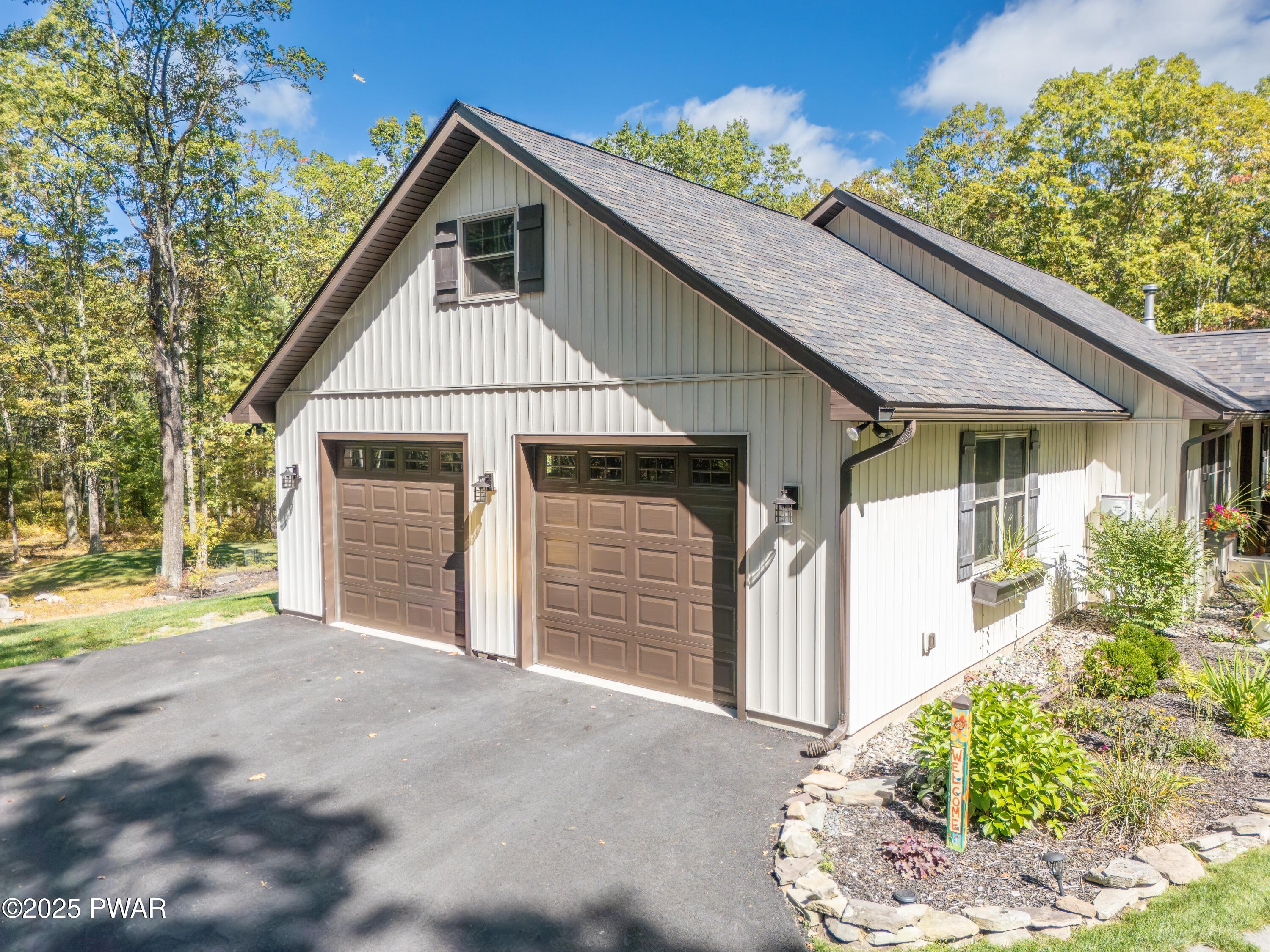 114 Whispering Oaks Road Greeley, PA 18425 - Photo 7 of 56 DJI_20250919130240_0360_D-2
