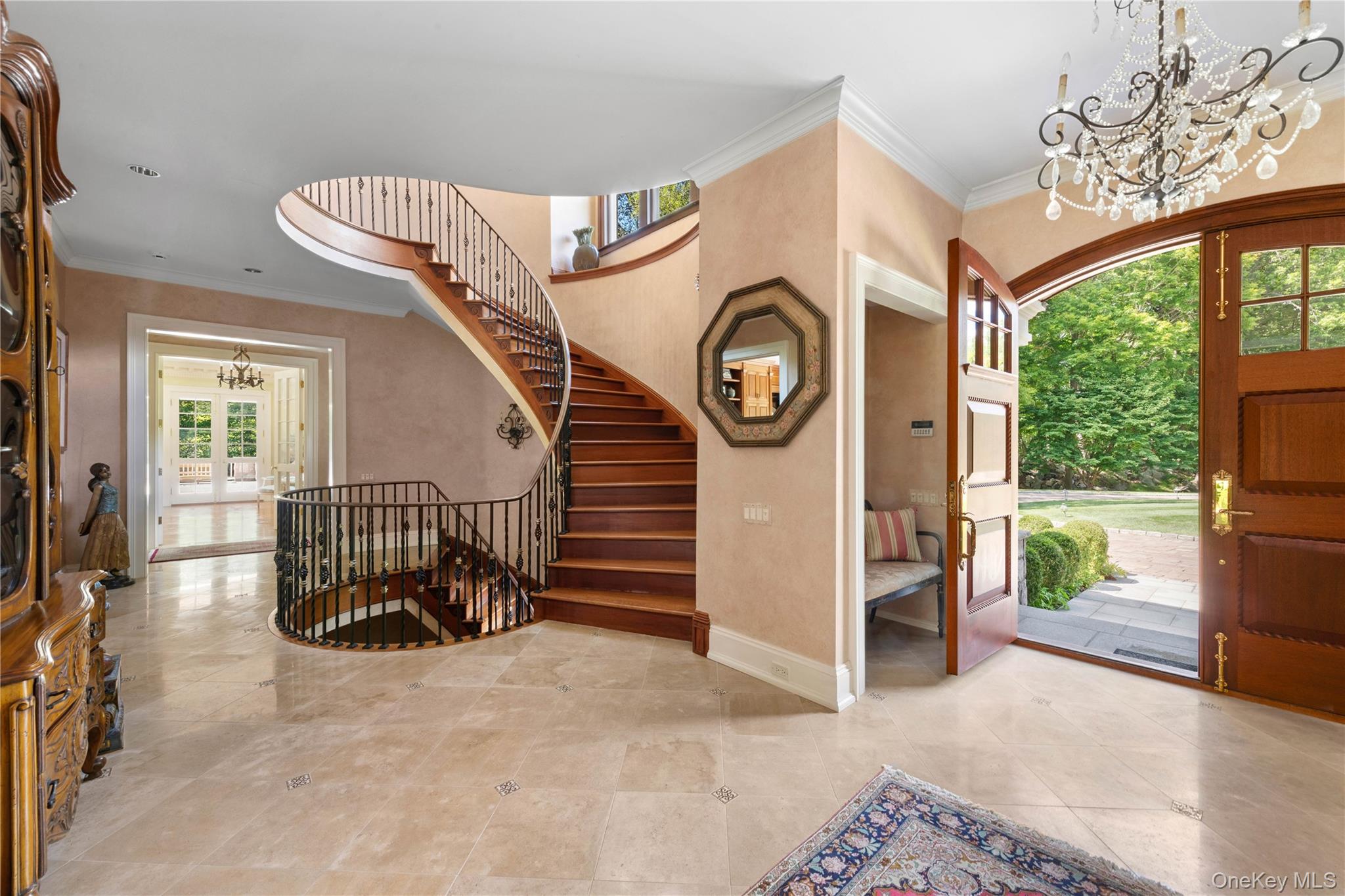 284 West Patent Road Bedford, NY 10549 - Photo 9 of 40 Entryway featuring a chandelier, ornamental molding, french doors, and stairway