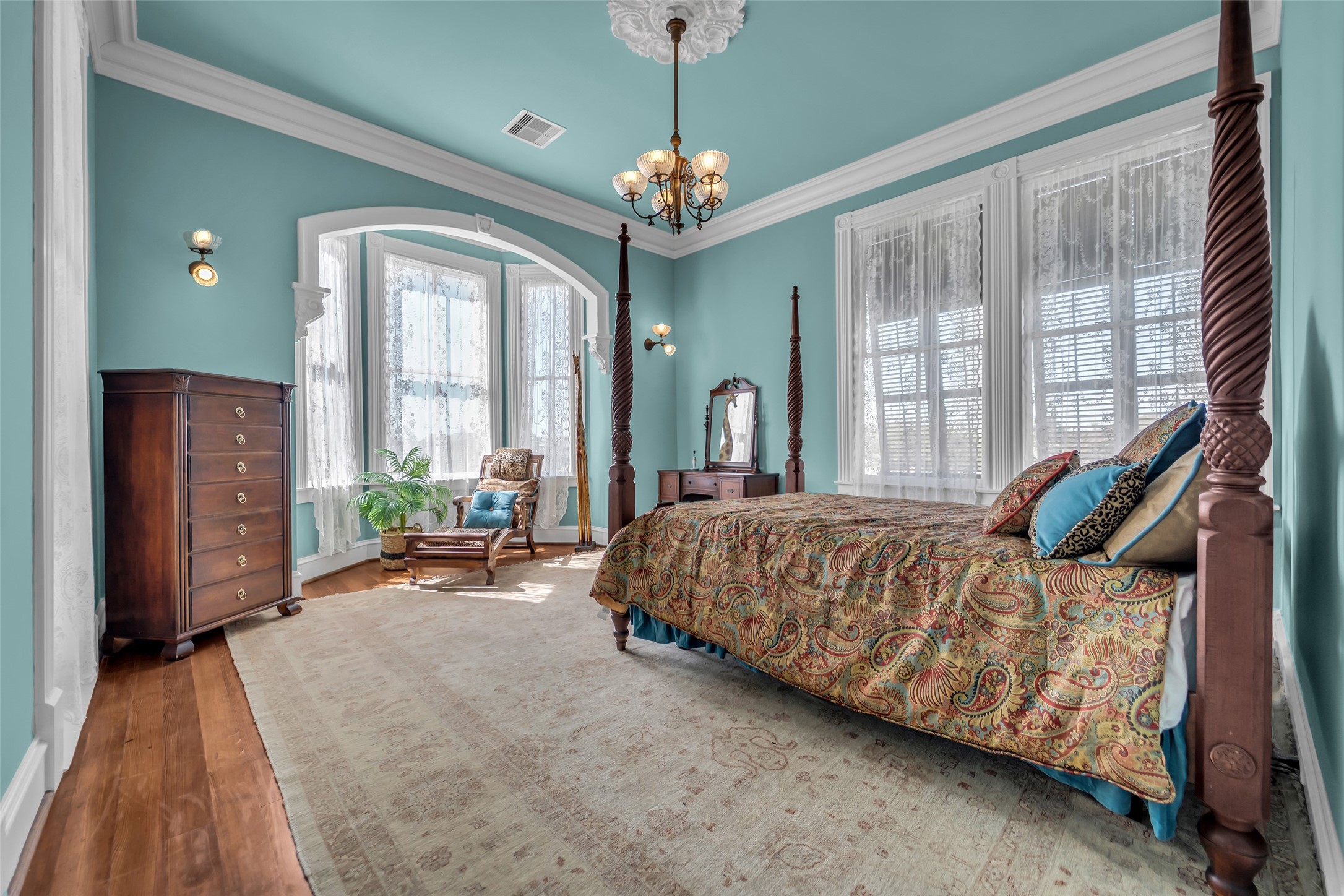 926 Winnie Street Galveston, TX 77550 - Photo 26 of 49 a bedroom with bed and windows