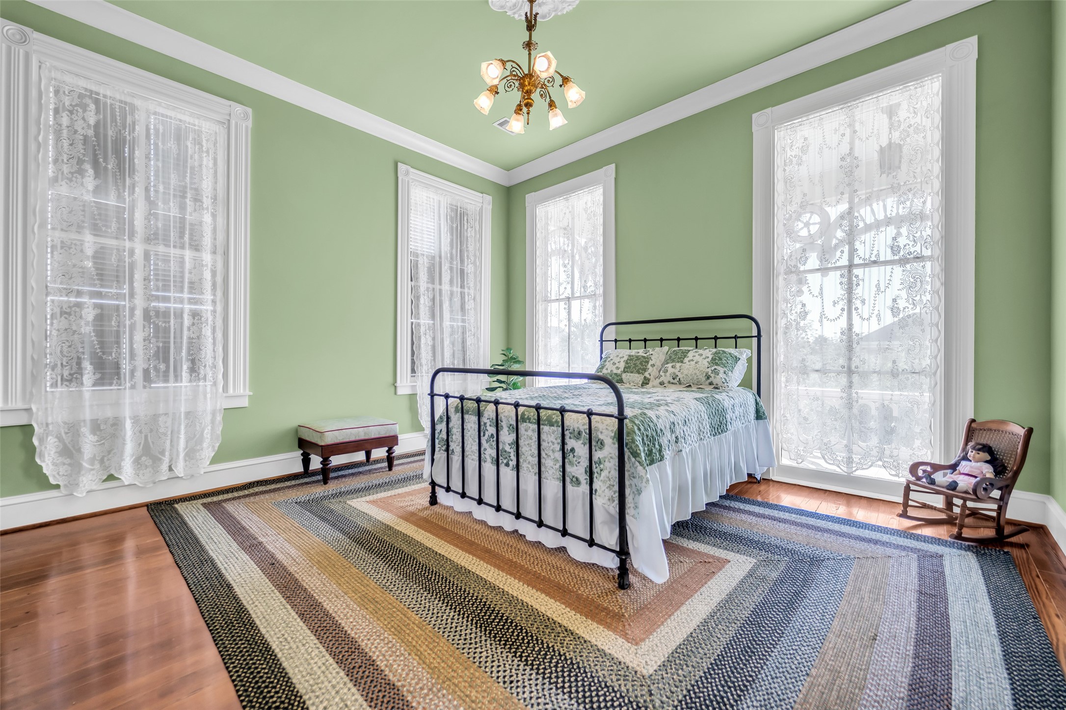 926 Winnie Street Galveston, TX 77550 - Photo 29 of 49 a bedroom with furniture and a large window