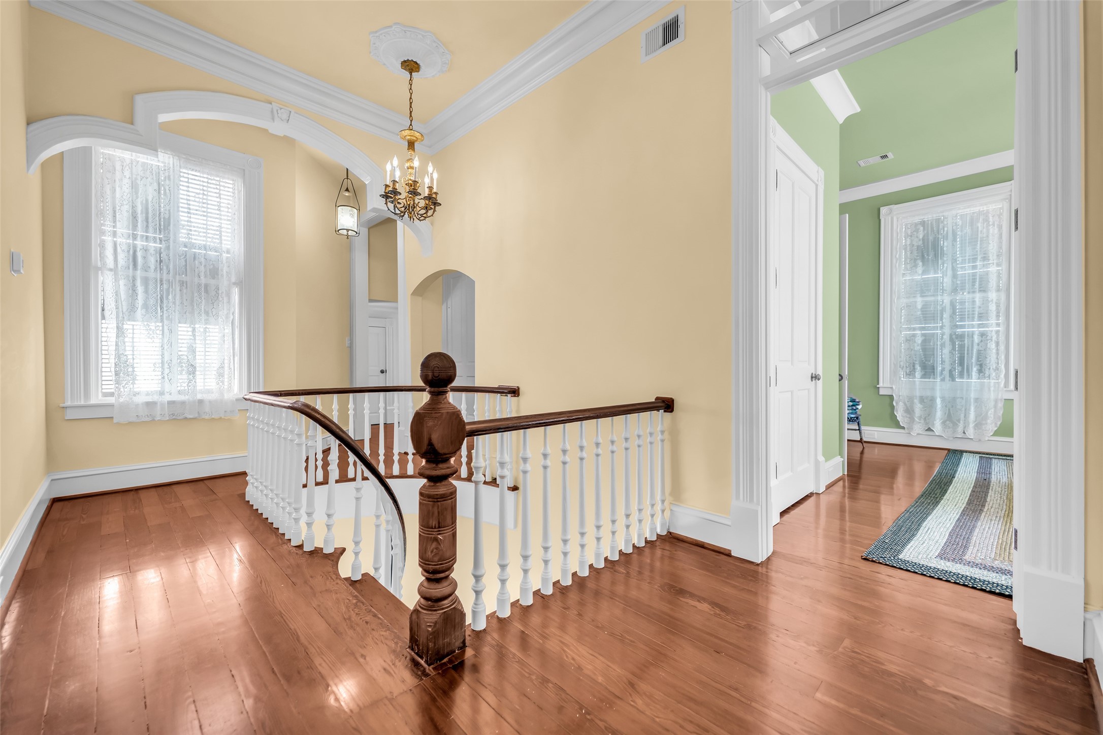 926 Winnie Street Galveston, TX 77550 - Photo 34 of 49 a view of entryway with wooden floor