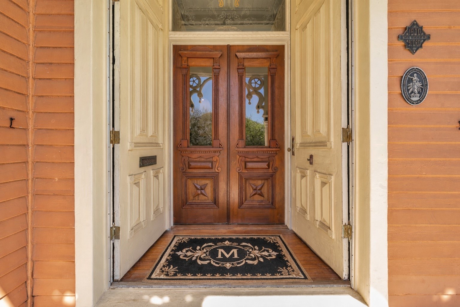 926 Winnie Street Galveston, TX 77550 - Photo 7 of 49 a view of a entryway door of the house