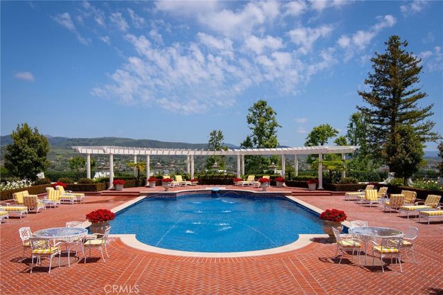 a outdoor space with pool and furniture
