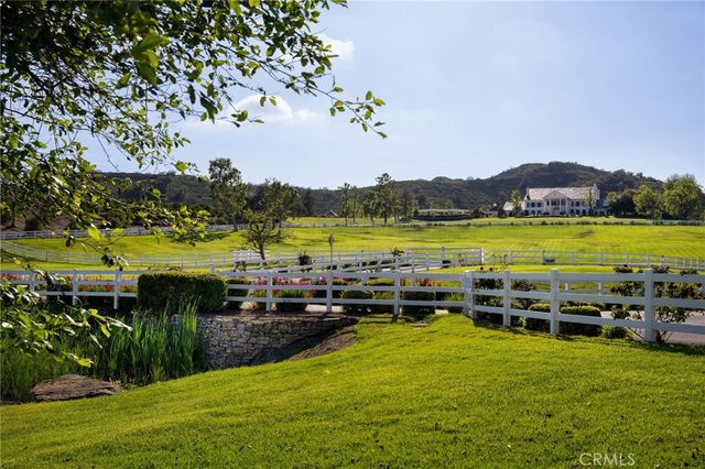 a view of a swimming pool and lake view