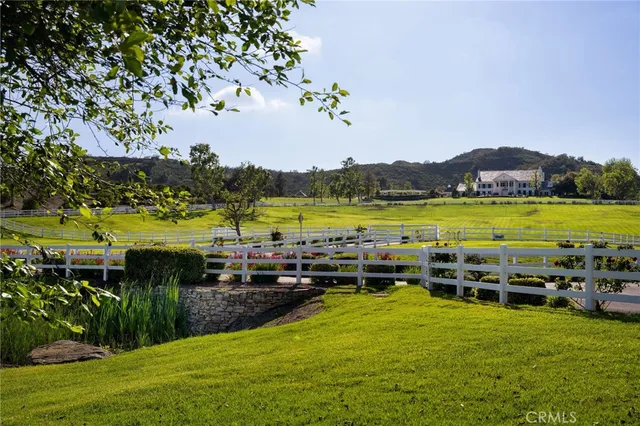a view of a swimming pool and lake view