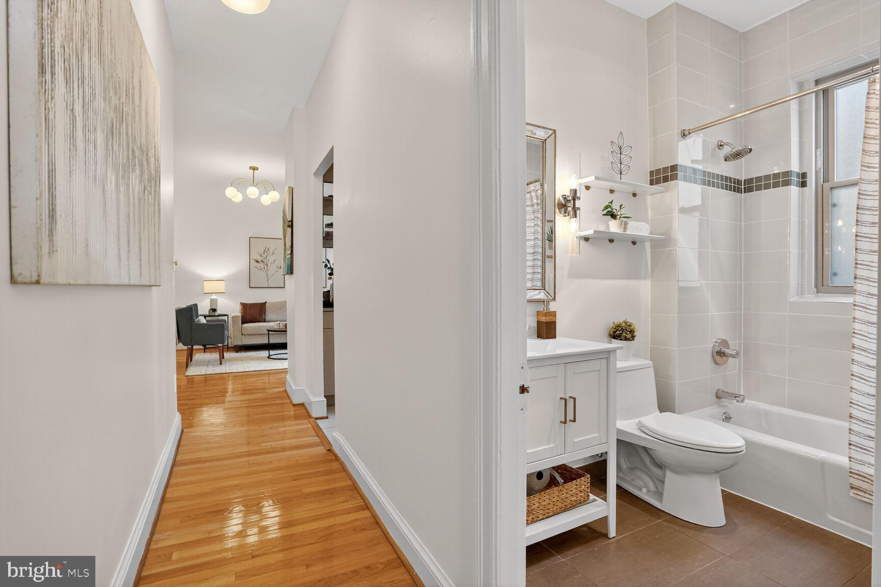 2010 Kalorama Road Northwest, Unit 506 Washington, DC 20009 - Photo 11 of 22 a bathroom with a sink a toilet and shower