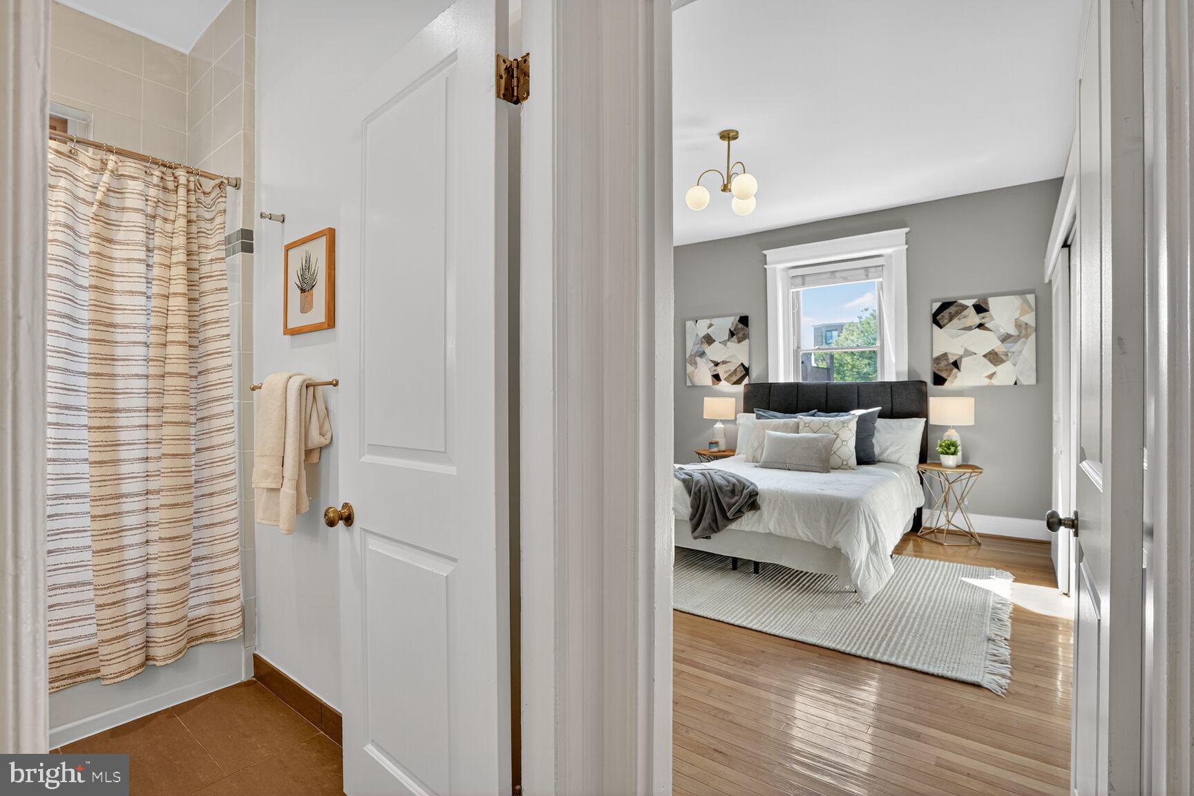 2010 Kalorama Road Northwest, Unit 506 Washington, DC 20009 - Photo 12 of 22 a bedroom with a bed and a window