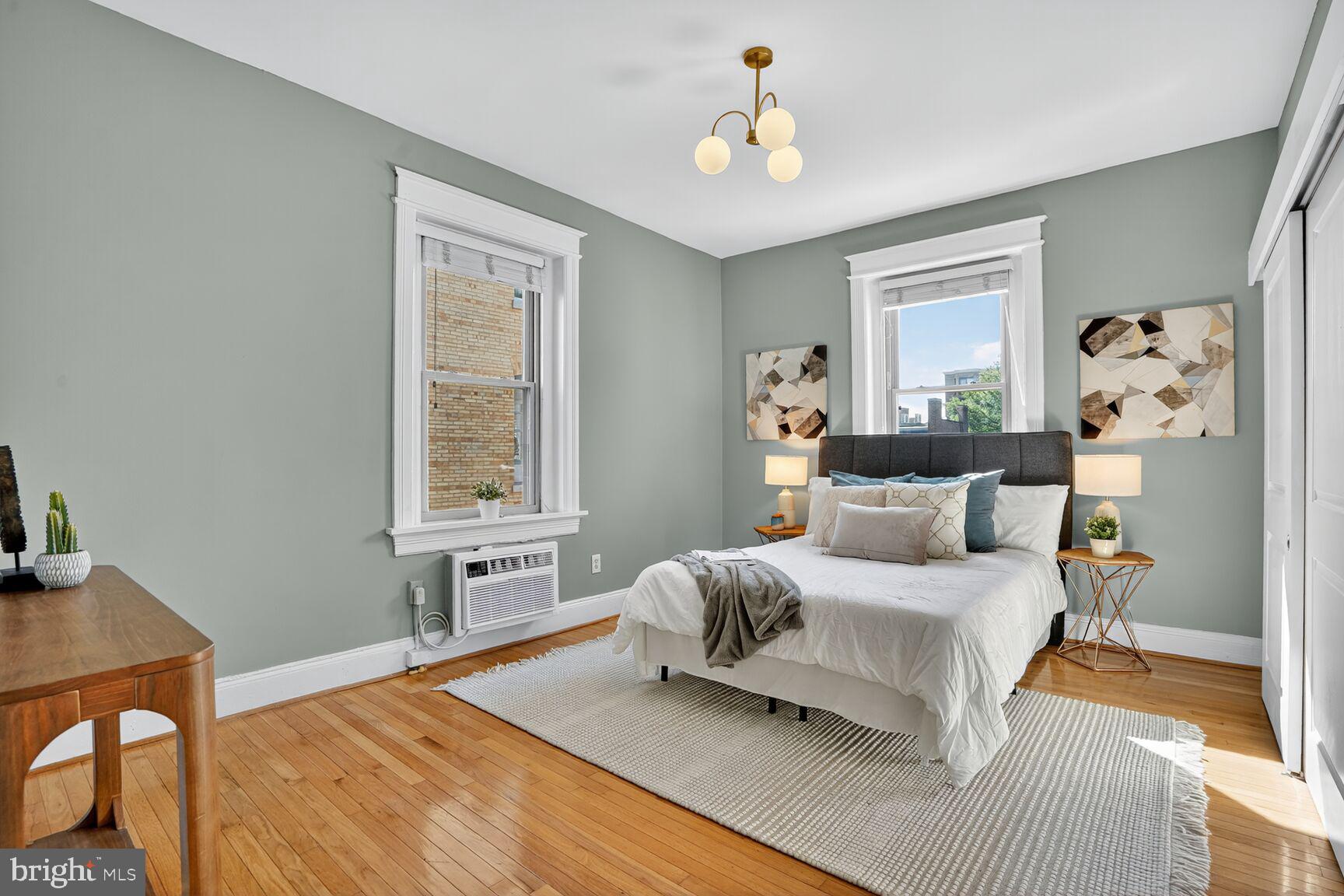 2010 Kalorama Road Northwest, Unit 506 Washington, DC 20009 - Photo 13 of 22 a bedroom with a large bed and a window