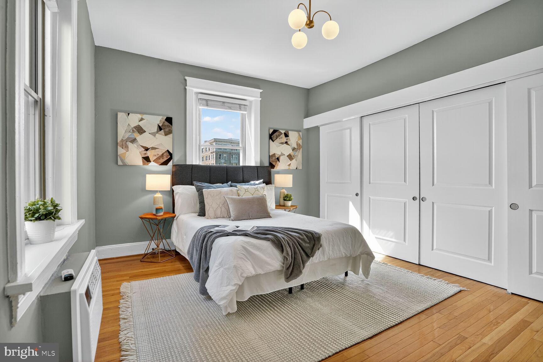 2010 Kalorama Road Northwest, Unit 506 Washington, DC 20009 - Photo 14 of 22 a spacious bedroom with a bed and a window