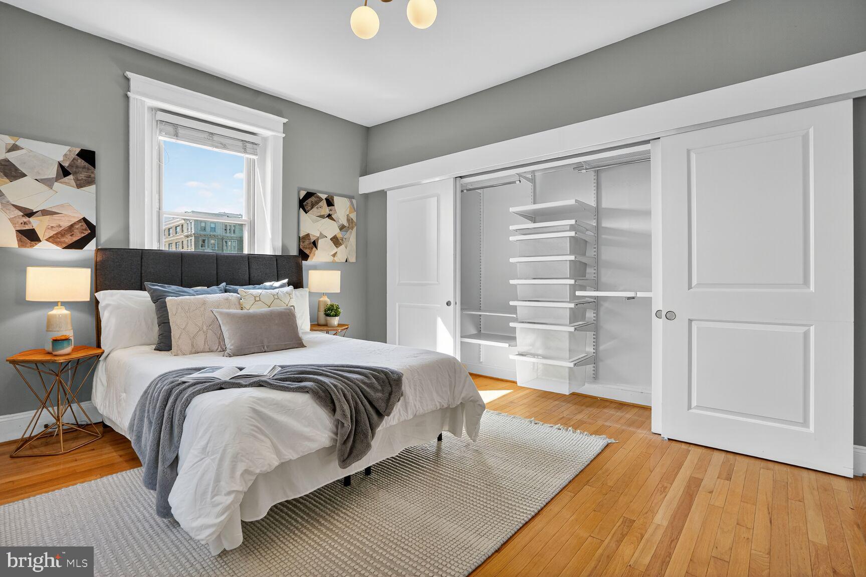 2010 Kalorama Road Northwest, Unit 506 Washington, DC 20009 - Photo 16 of 22 a spacious bedroom with a bed and a window