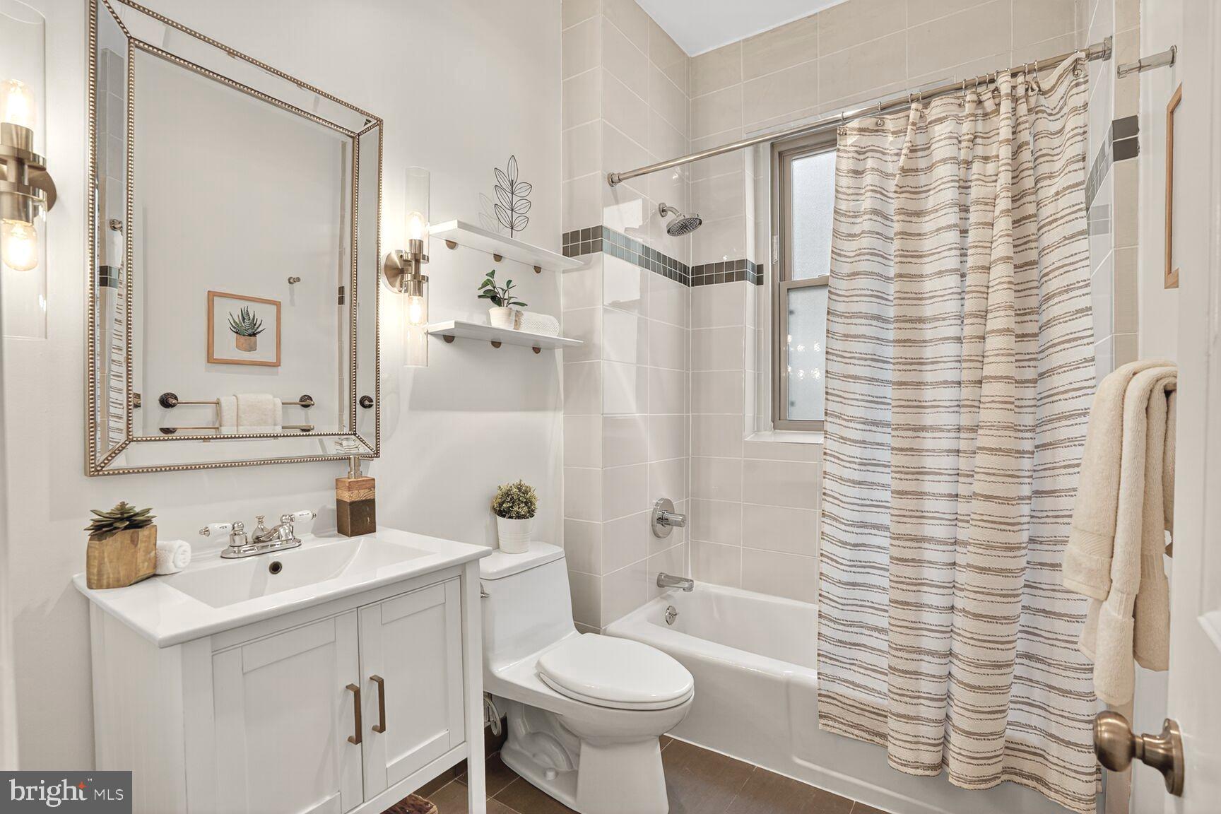 2010 Kalorama Road Northwest, Unit 506 Washington, DC 20009 - Photo 17 of 22 a bathroom with a sink toilet and shower