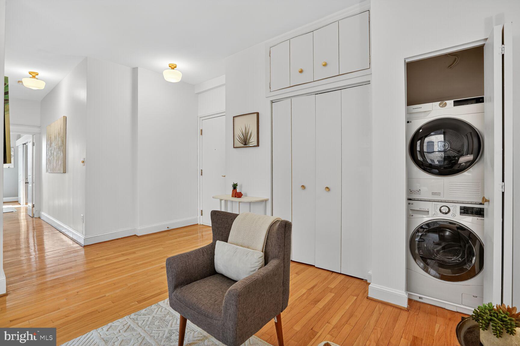 2010 Kalorama Road Northwest, Unit 506 Washington, DC 20009 - Photo 18 of 22 a view of a hallway with washer and dryer
