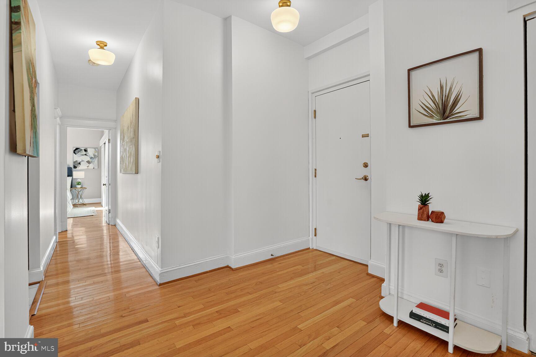2010 Kalorama Road Northwest, Unit 506 Washington, DC 20009 - Photo 19 of 22 a view of empty room with wooden floor