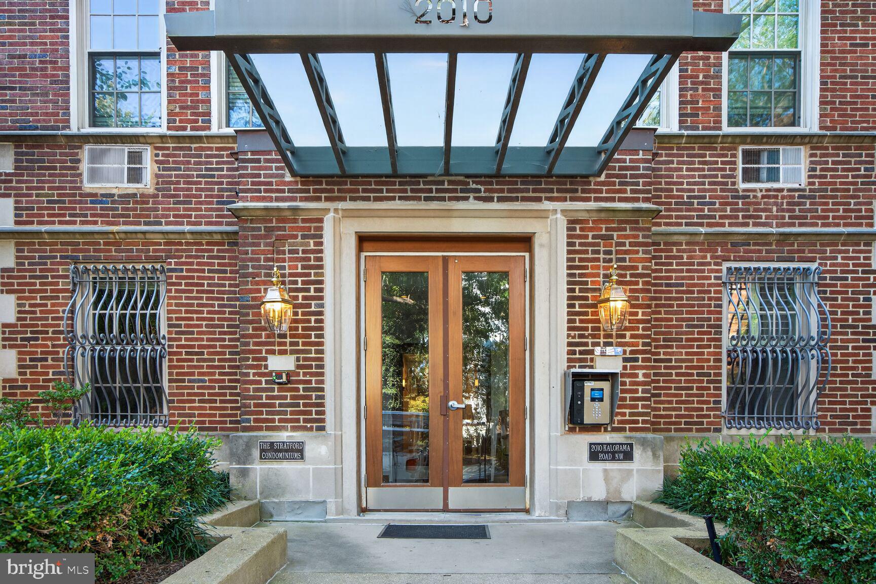 2010 Kalorama Road Northwest, Unit 506 Washington, DC 20009 - Photo 20 of 22 a view of a brick house with a door