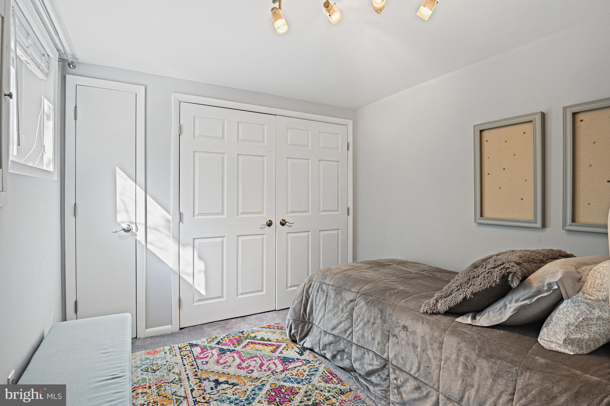 6602 Jerry Place McLean, VA 22101 - Photo 20 of 28 a bedroom with a bed and a window