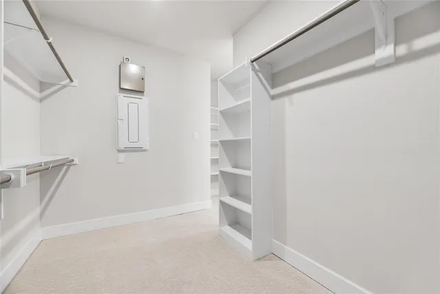 a view of an empty walk in closet