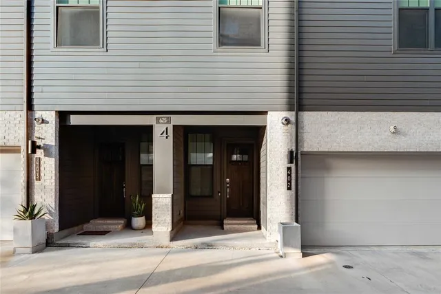 a view of a house with white door