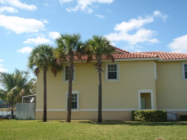 a view of a backyard with a slide