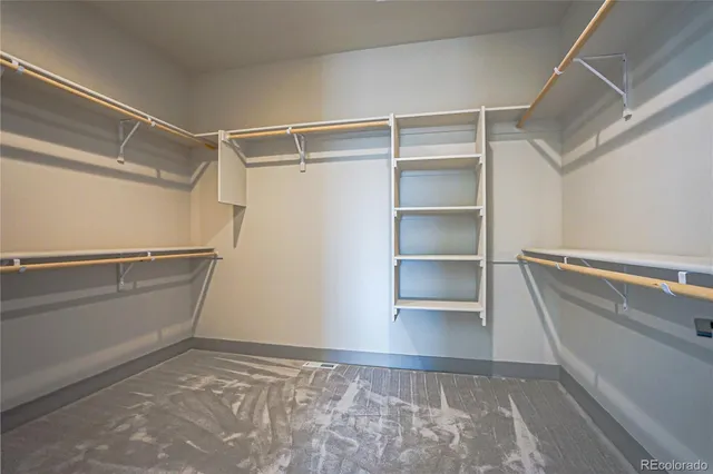 a view of an empty walk in closet