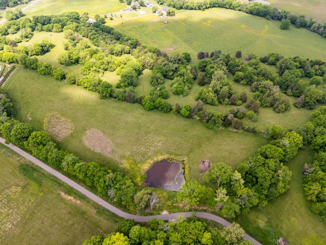 a view of a lake with a city