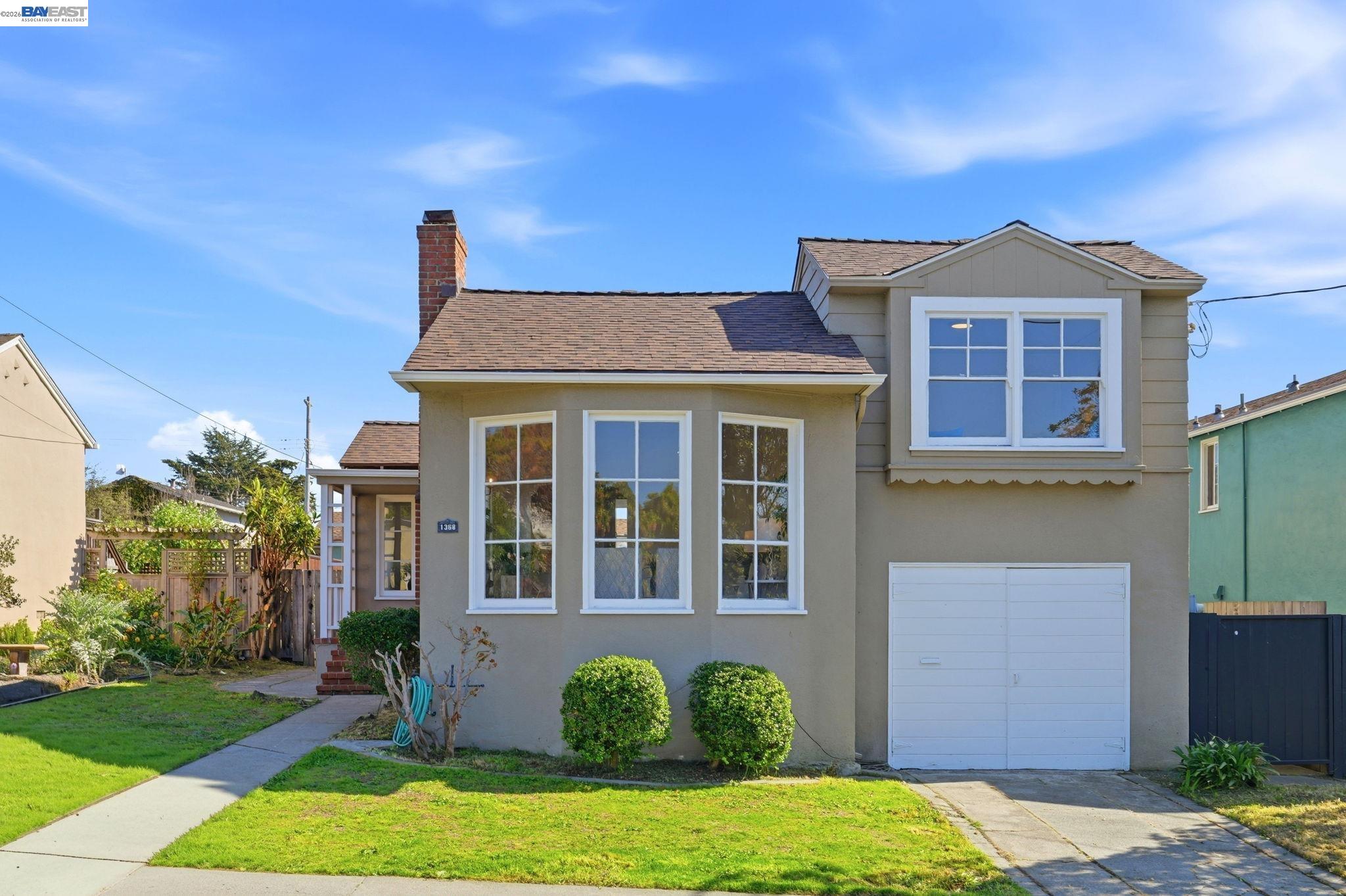 1368 Rose Street Berkeley, CA 94702 - Photo 1 of 21 a front view of a house with garden