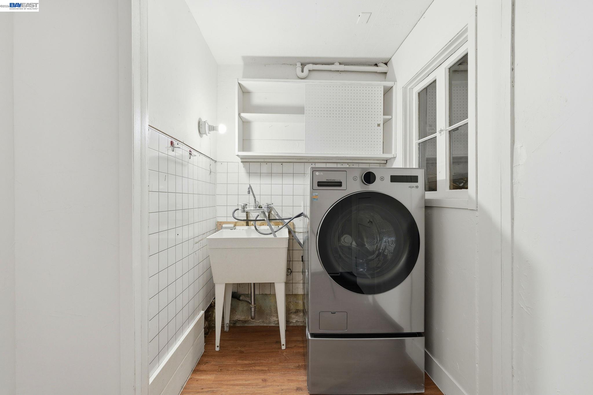 1368 Rose Street Berkeley, CA 94702 - Photo 16 of 21 a utility room with dryer and washer