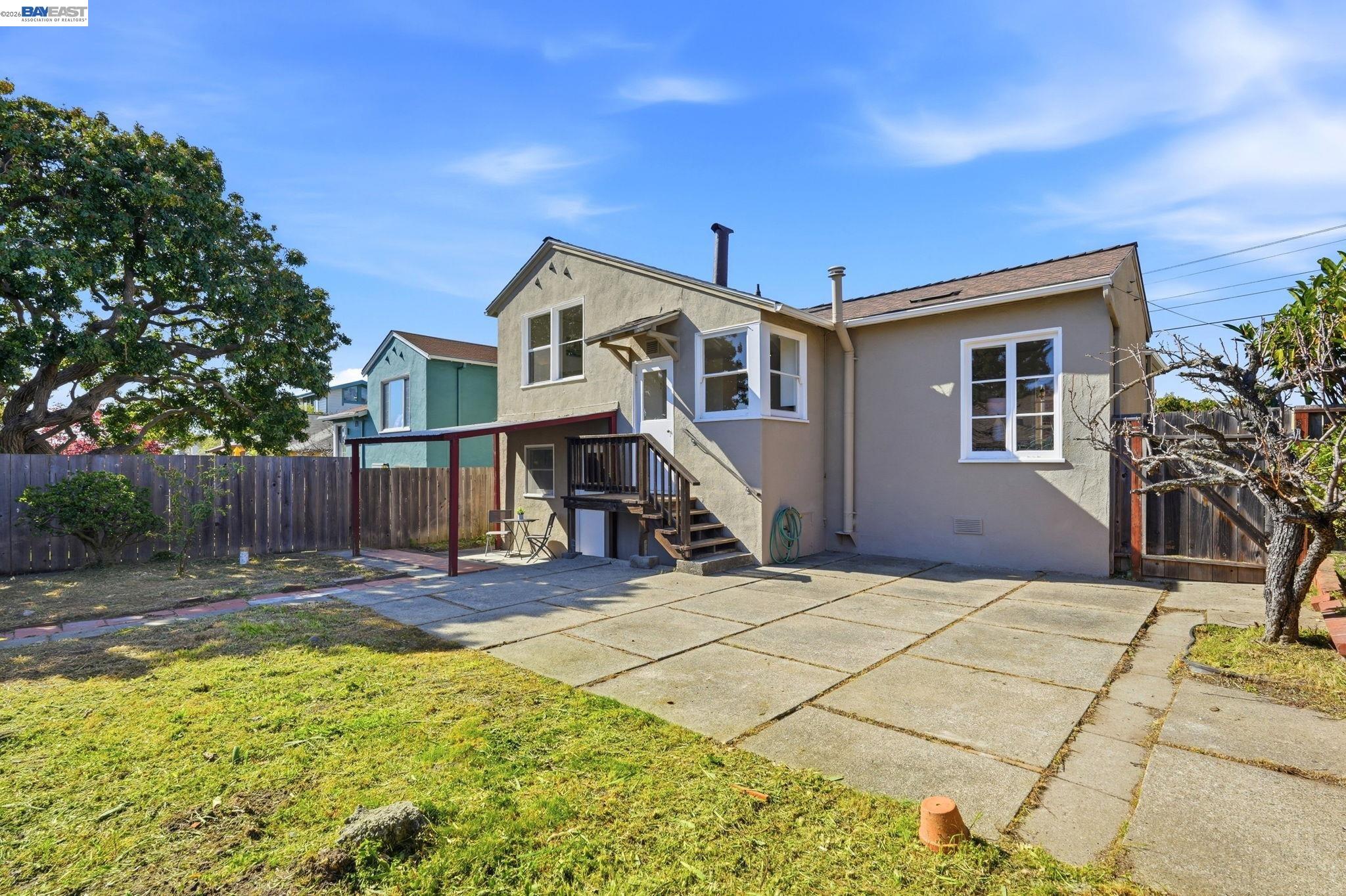 1368 Rose Street Berkeley, CA 94702 - Photo 18 of 21 a front view of a house with a yard
