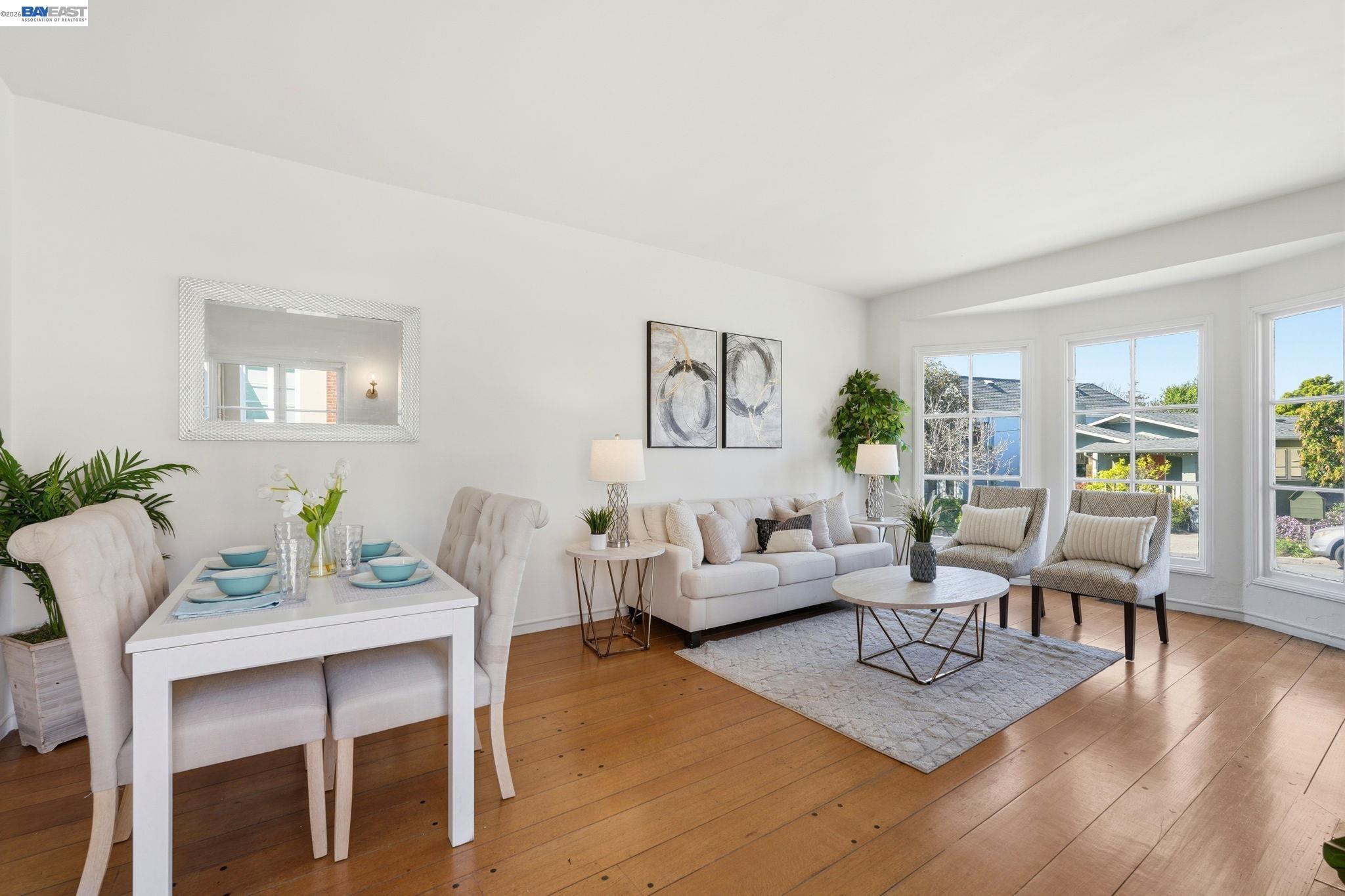 1368 Rose Street Berkeley, CA 94702 - Photo 8 of 21 a living room with furniture and wooden floor