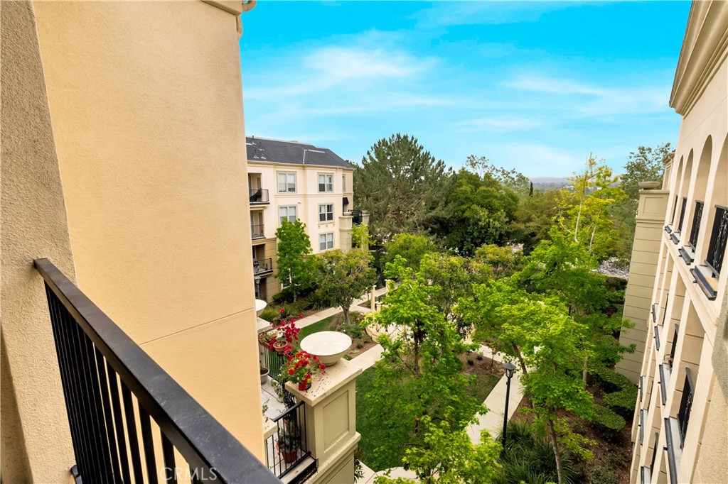 a view of a balcony with an outdoor space