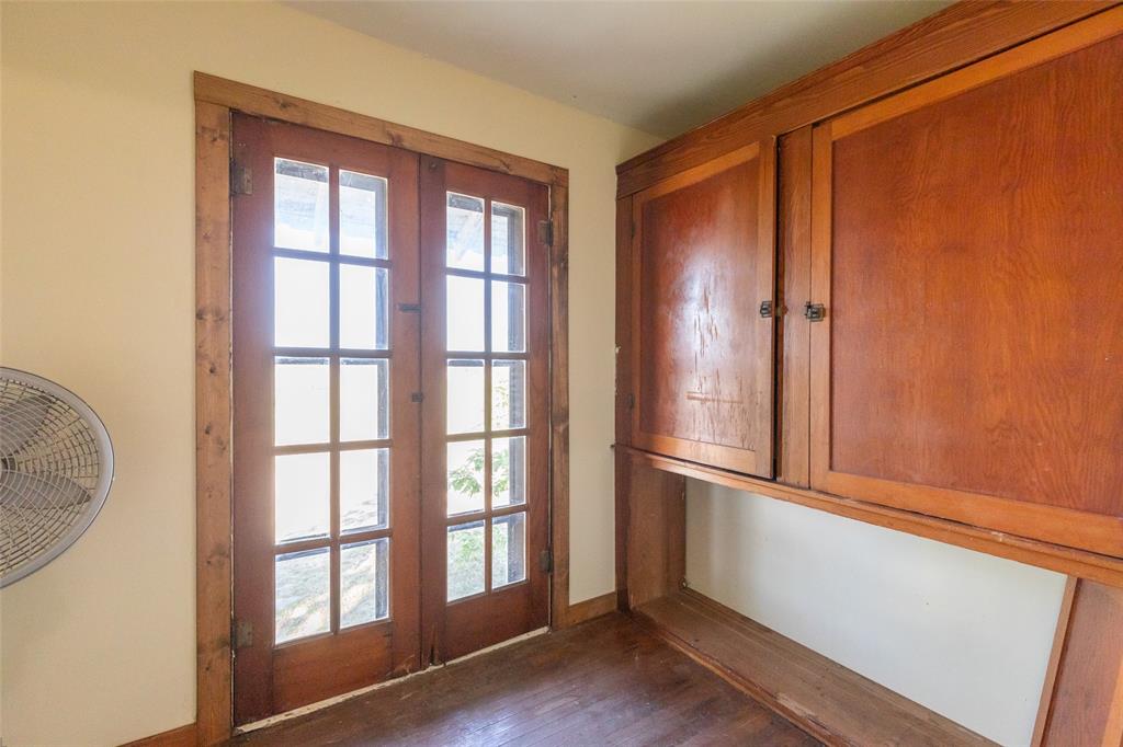 640 Ground Street Moran, TX 76464 - Photo 19 of 35 Wood-finish French doors with multiple glass panes