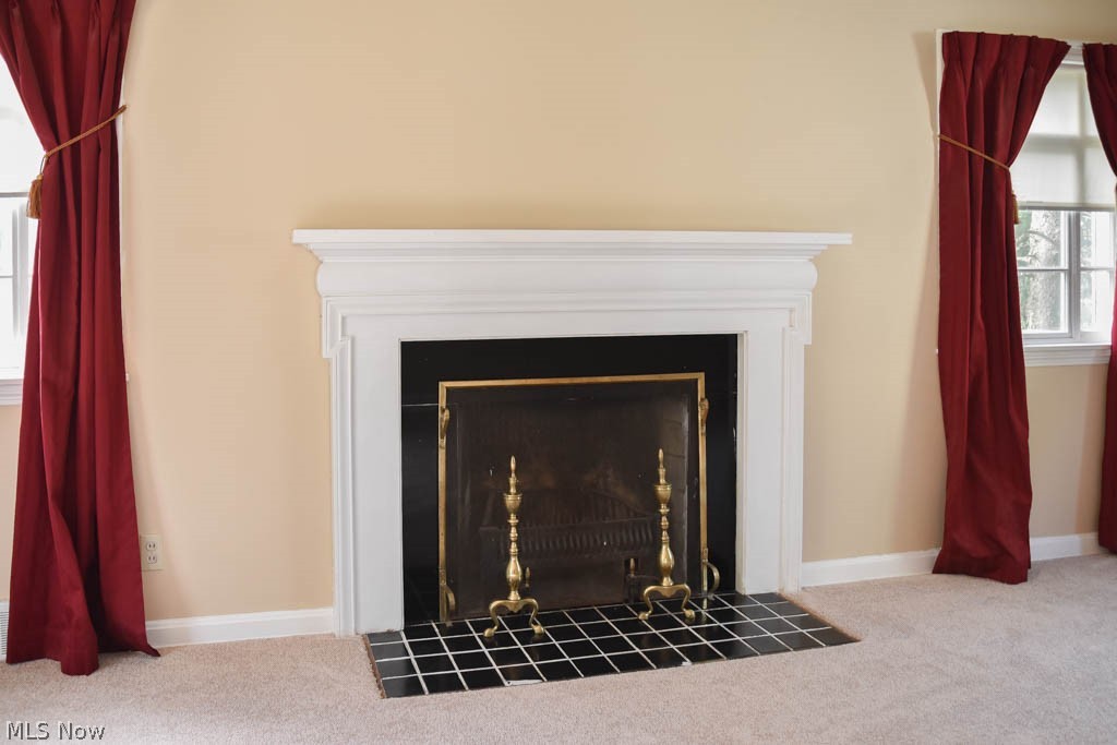 444 Schocalog Road Akron, OH 44320 - Photo 10 of 23 Living room fireplace.