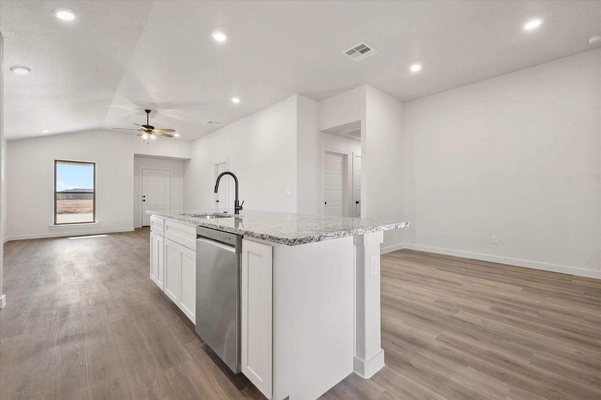 3108 138th Place Lubbock, TX 79423 - Photo 10 of 21 a kitchen with sink and cabinets