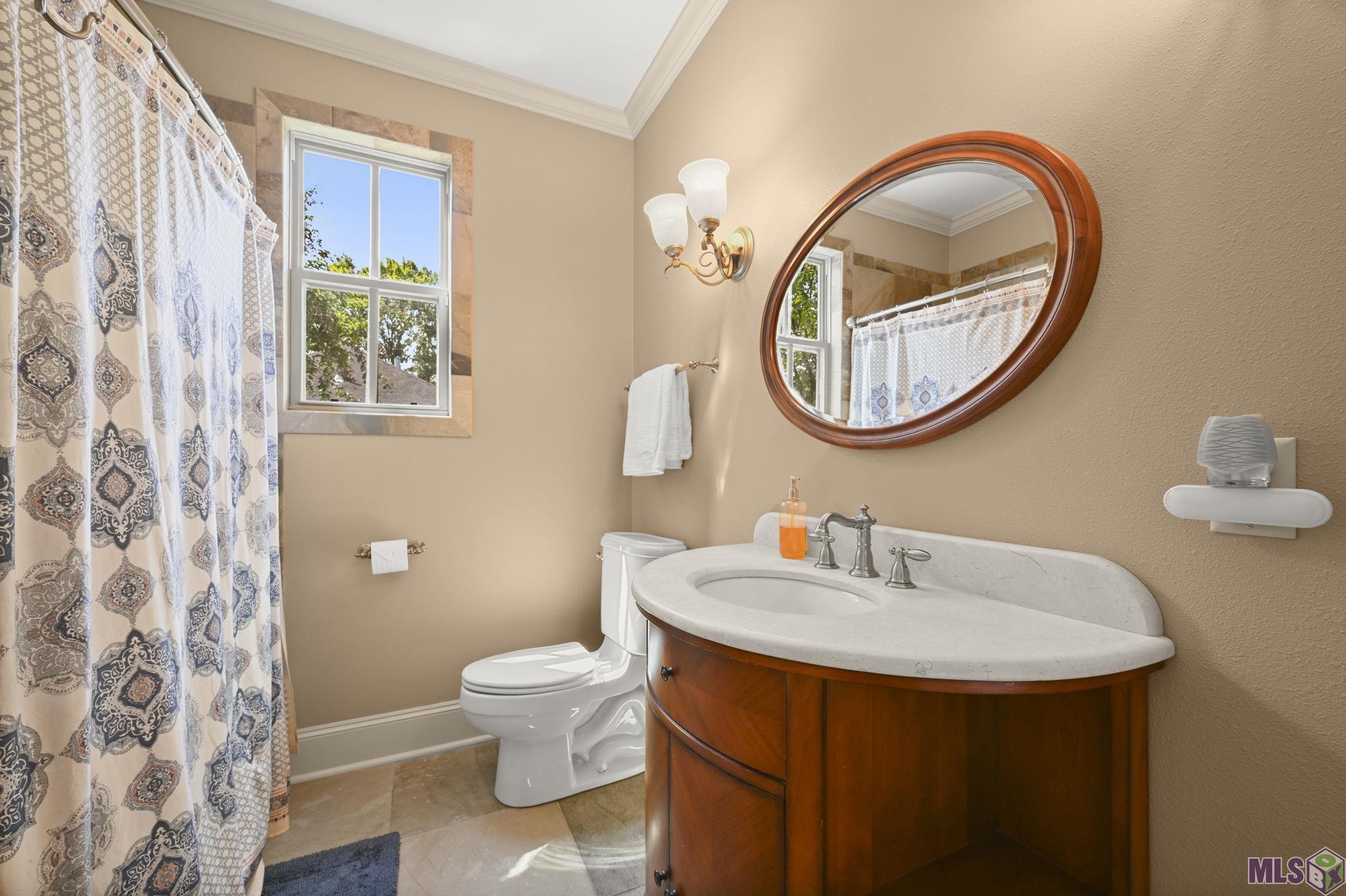 14989 Peairs Road Pride, LA 70770 - Photo 14 of 44 Hall Bathroom