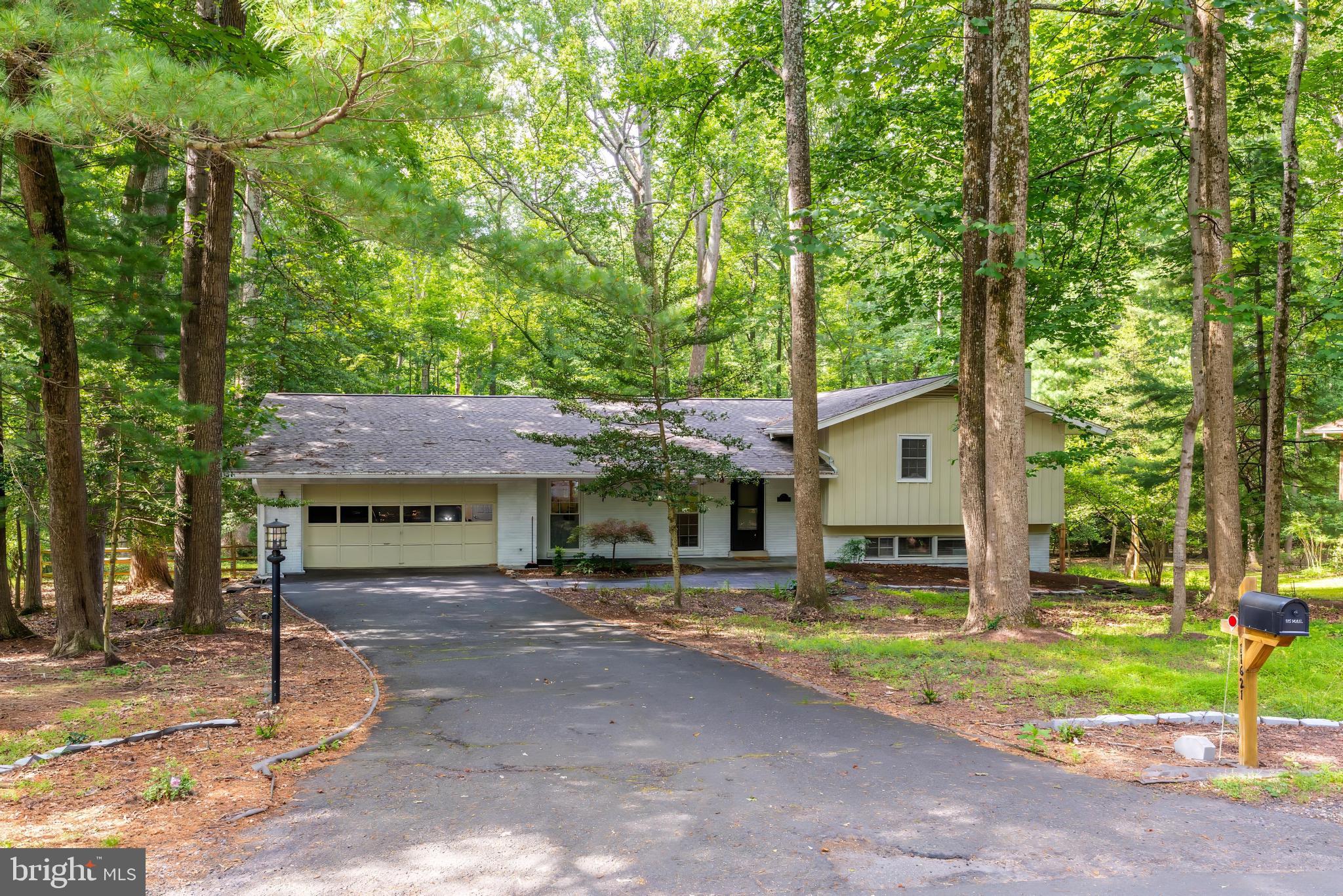 11621 Sourwood Lane Reston, VA 20191 - Photo 2 of 26 a house view with a sitting space