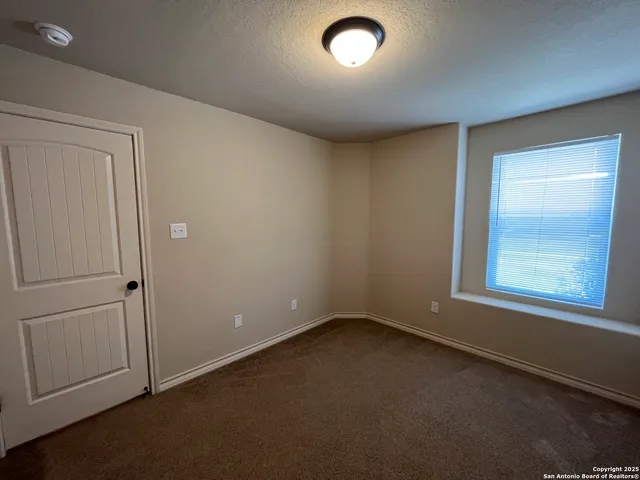 a bathroom with a white bath tub