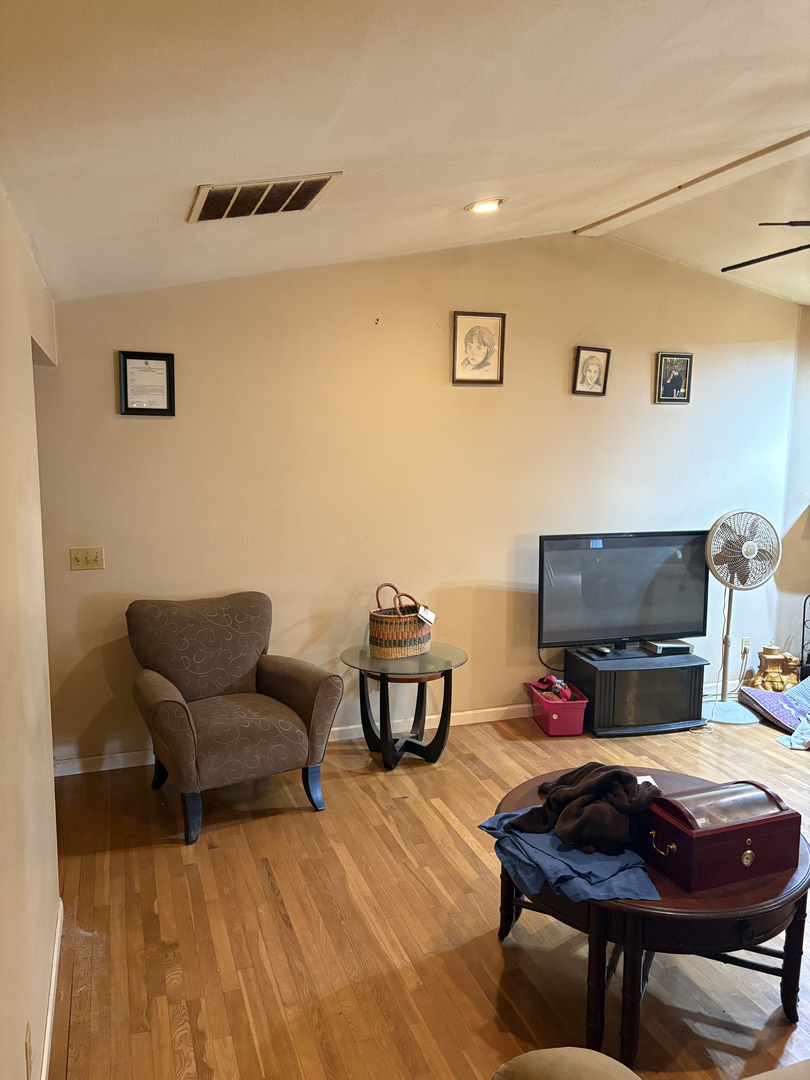 1003 Cyndy Lane Champaign, IL 61822 - Photo 11 of 25 a living room with furniture and a couch