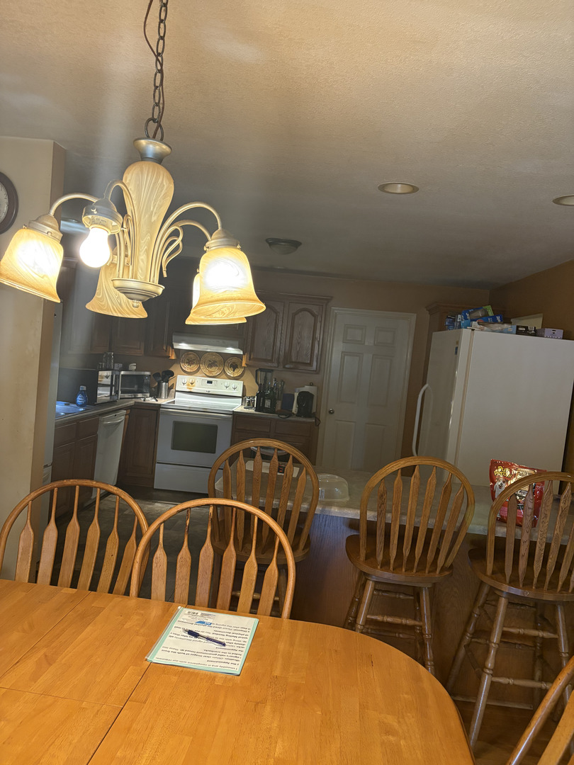 1003 Cyndy Lane Champaign, IL 61822 - Photo 14 of 25 a view of swimming pool and dining room