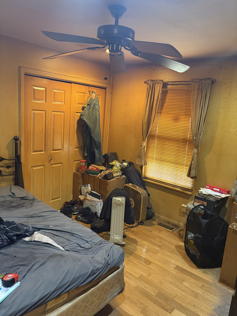 1003 Cyndy Lane Champaign, IL 61822 - Photo 8 of 25 a bedroom with a bed and a closet