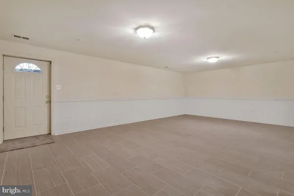 an empty room with an entryway