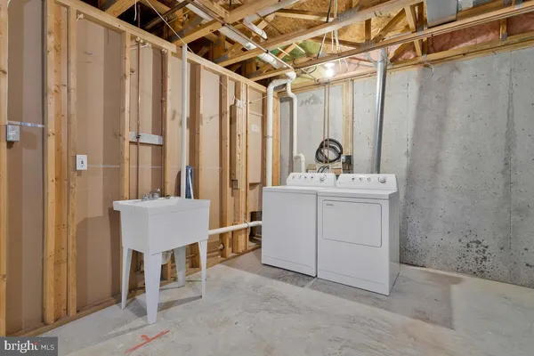 a utility room with a washer and dryer