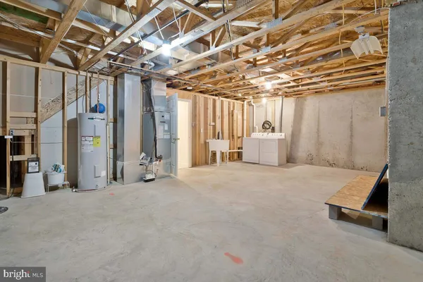 a view of an empty room with white walls