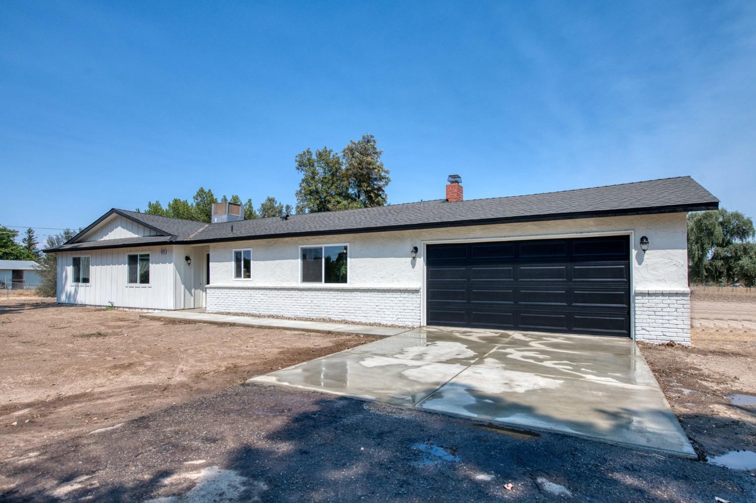 16715 Monreal Road Madera, CA 93636 - Photo 20 of 39 a house view with a outdoor space