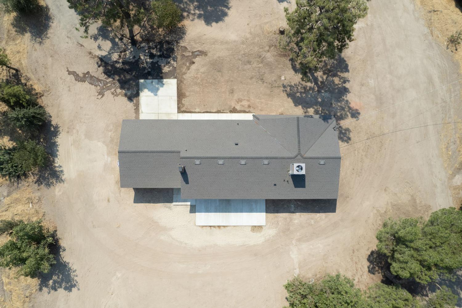 16715 Monreal Road Madera, CA 93636 - Photo 32 of 39 an aerial view of a house with a yard