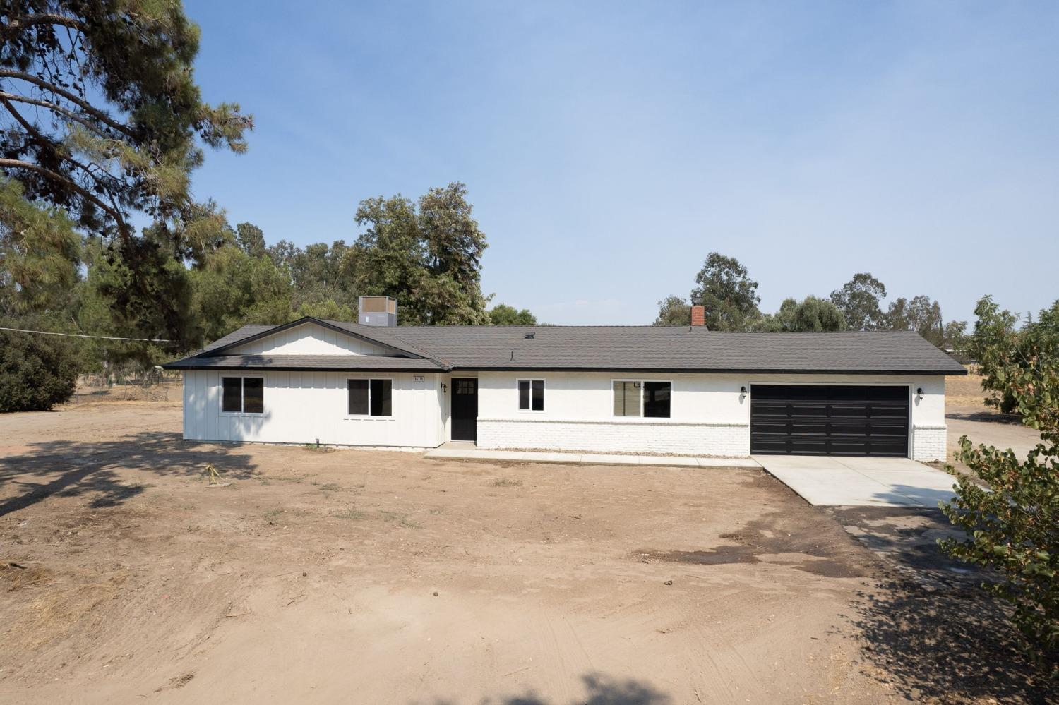 16715 Monreal Road Madera, CA 93636 - Photo 36 of 39 front view of house with a yard