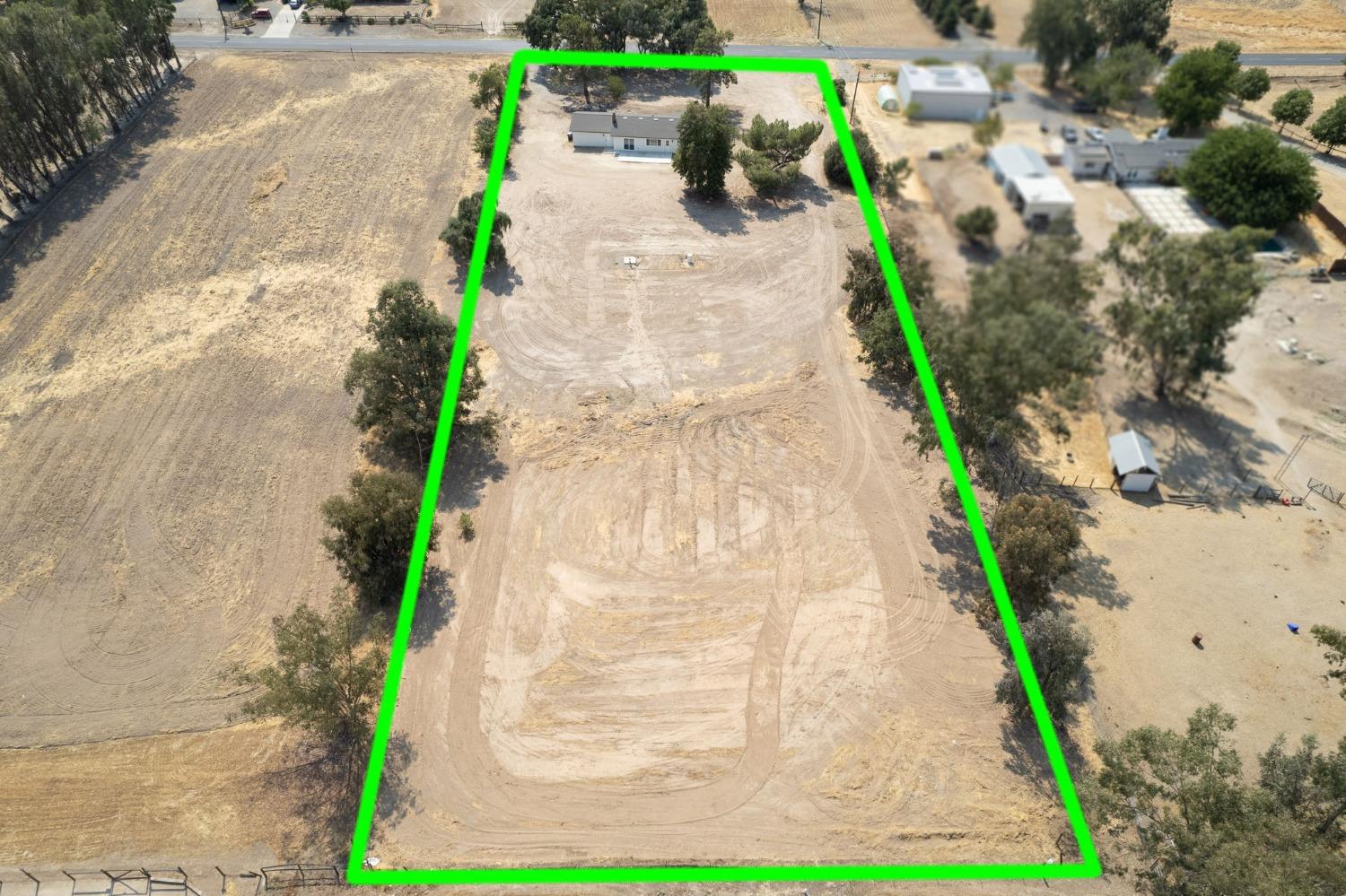 16715 Monreal Road Madera, CA 93636 - Photo 5 of 39 a view of a pathway with a pathway