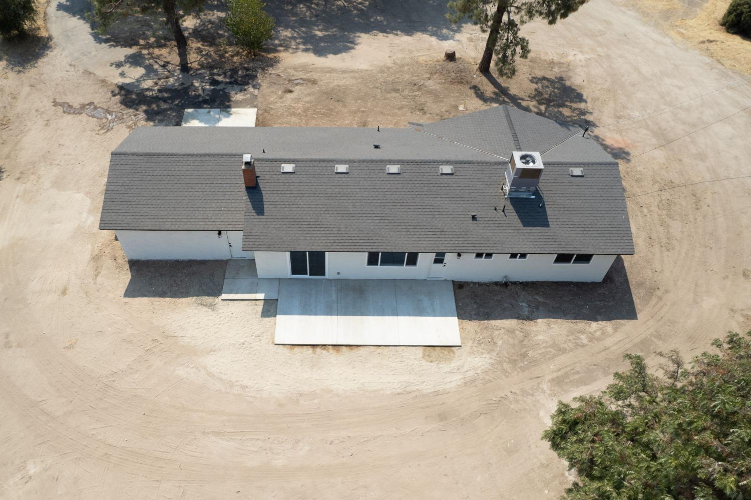 16715 Monreal Road Madera, CA 93636 - Photo 10 of 39 an aerial view of residential houses with outdoor space