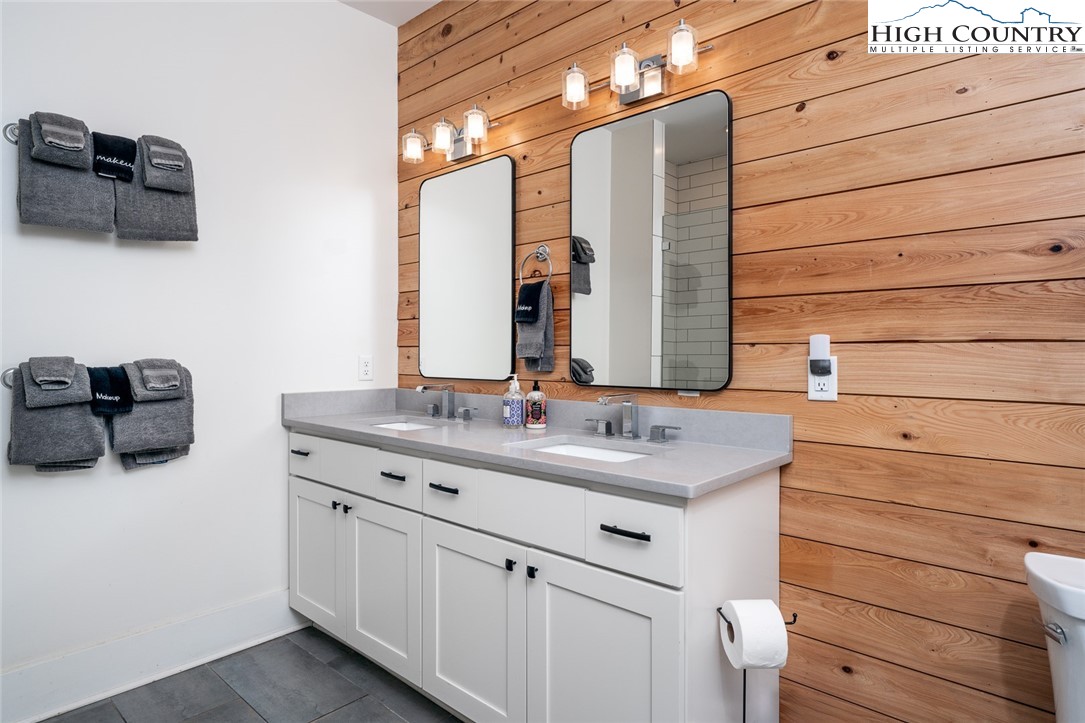 1150 Main Street, Unit DOGWOOD Blowing Rock, NC 28605 - Photo 16 of 26 a bathroom with a sink and a mirror