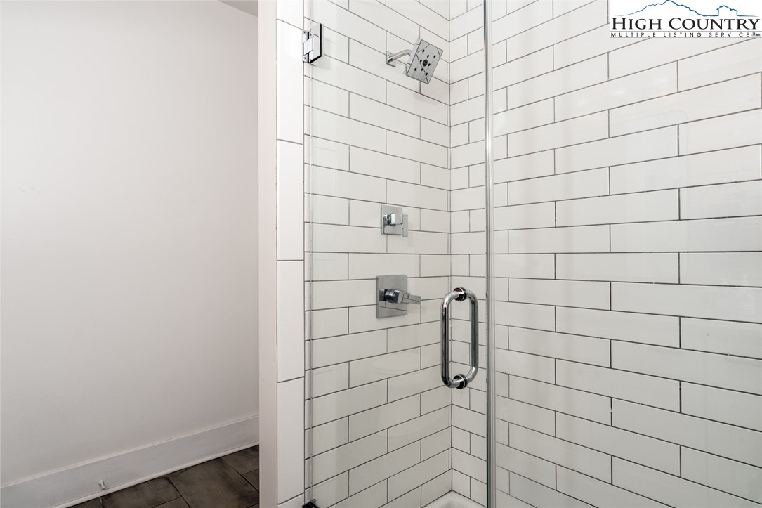 1150 Main Street, Unit DOGWOOD Blowing Rock, NC 28605 - Photo 19 of 26 a bathroom with a shower